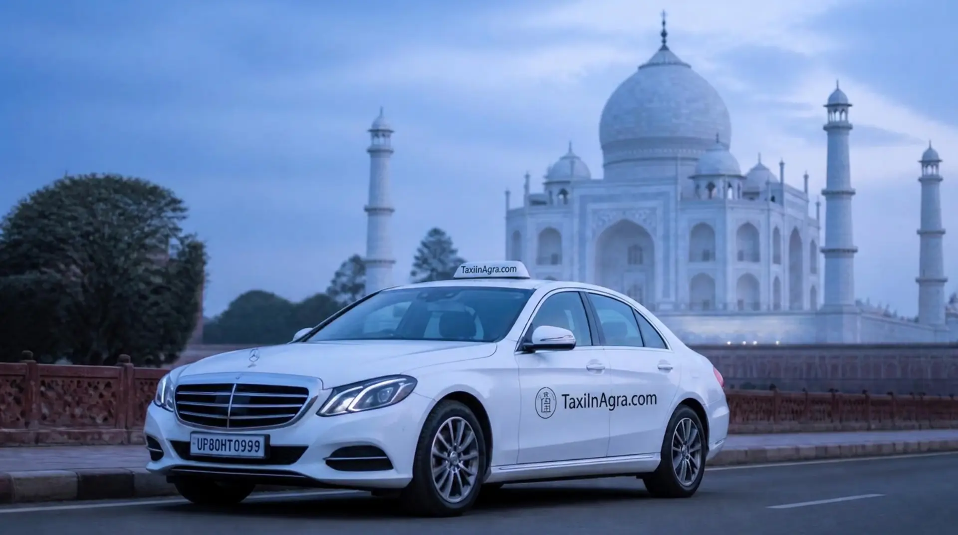 Premium white sedan taxi on a quiet Agra road at twilight